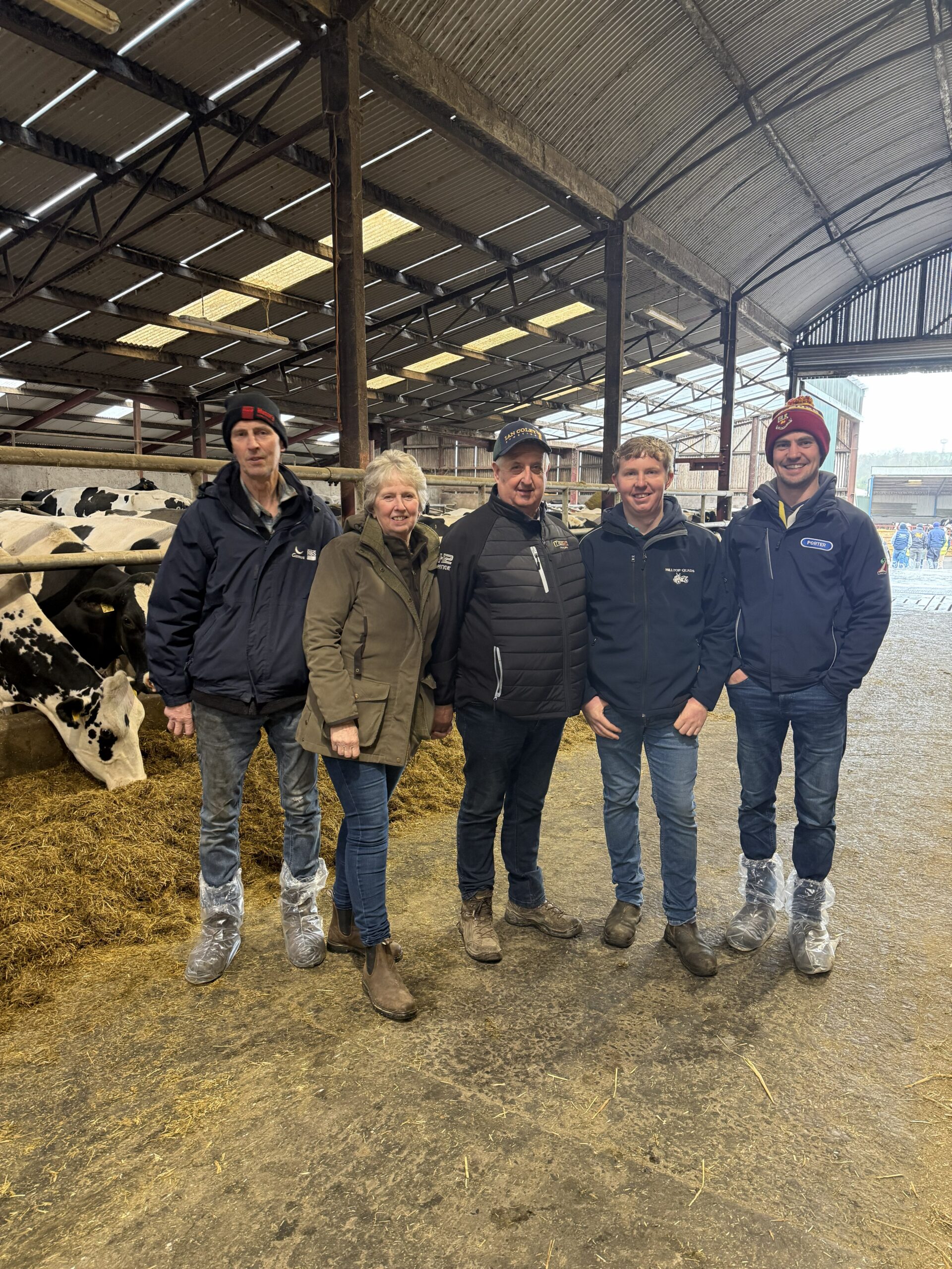 NI open meeting 14 April 2026 Five attendees stood in a cattle shed at the NI Open Meeting